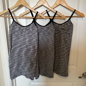 Next Women's medium tank bundle of 3. Can add padding. Adjustable straps.